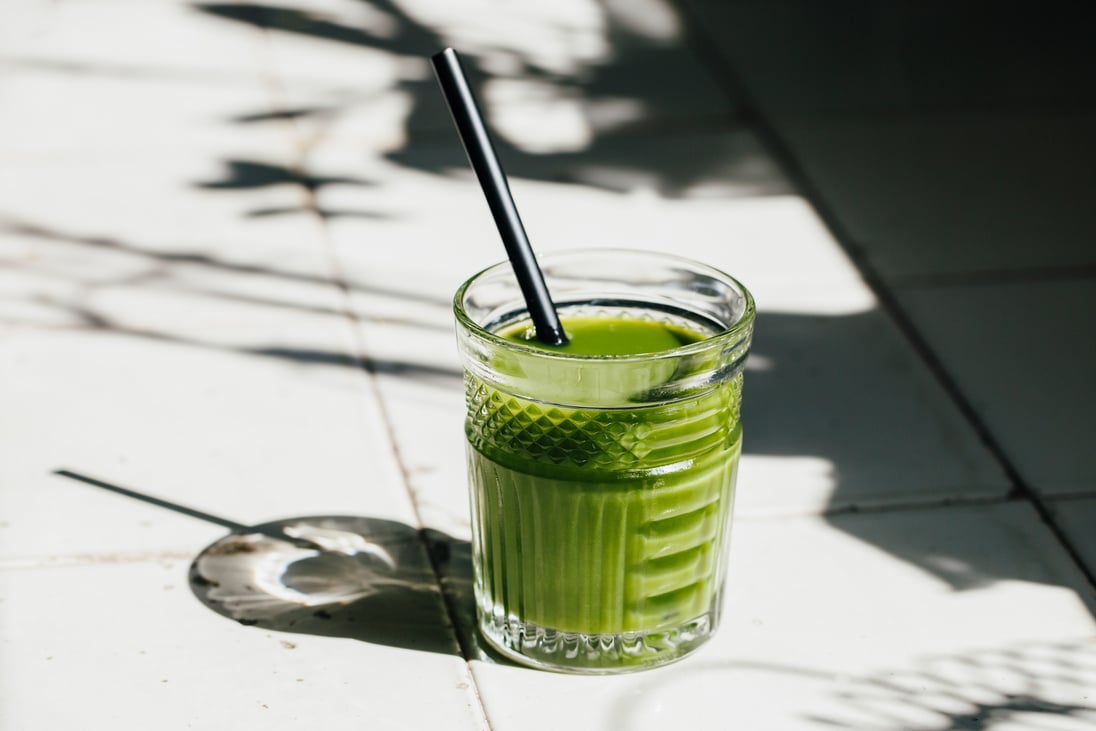 Green juice glass